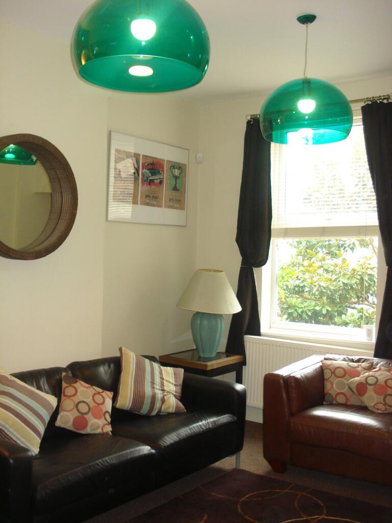 A stylish and inviting living room with vibrant...