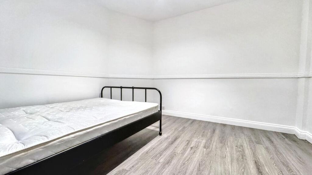 A spacious and bright double bedroom, perfect f...