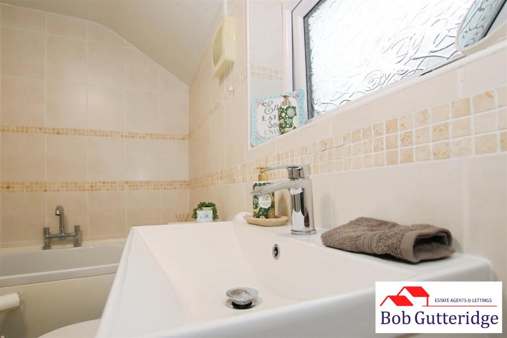 FULLY TILED GROUND FLOOR BATHROOM