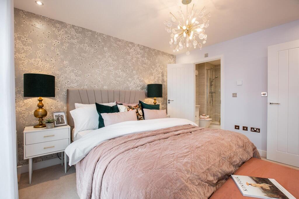The main bedroom features and en-suite shower room