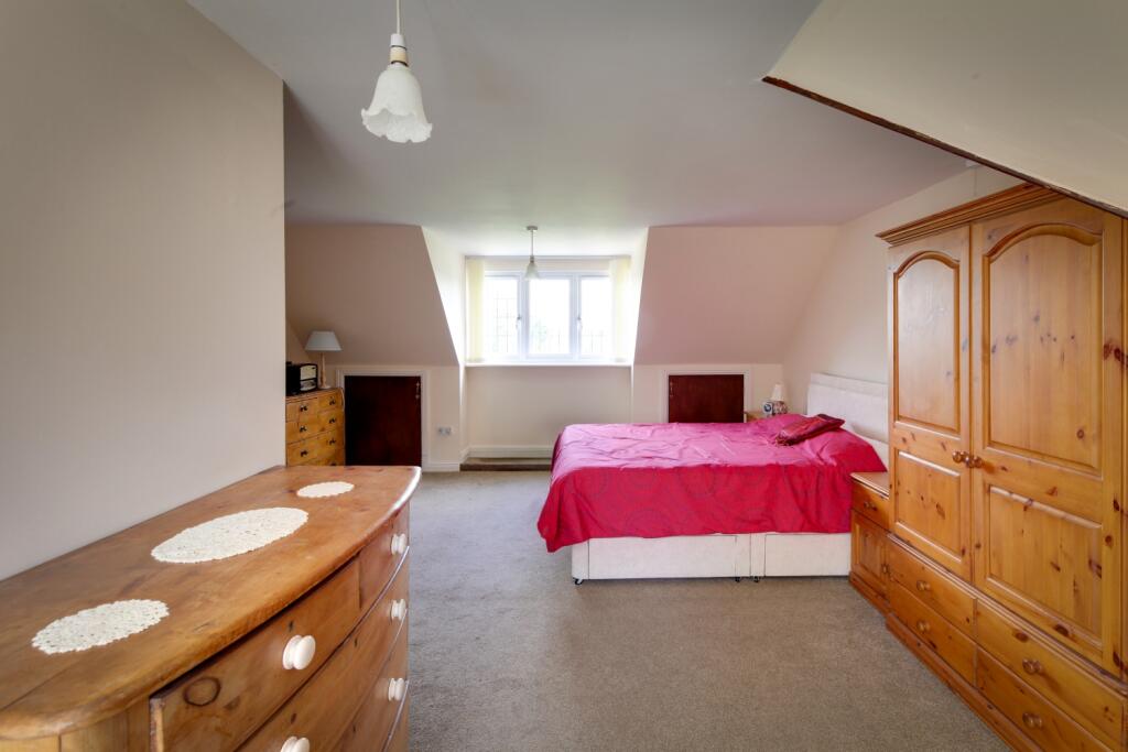 bedroom view to front triple dorma window