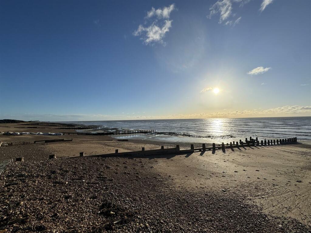 THE BEACH AT THE BOTTOM OF SEA LANE