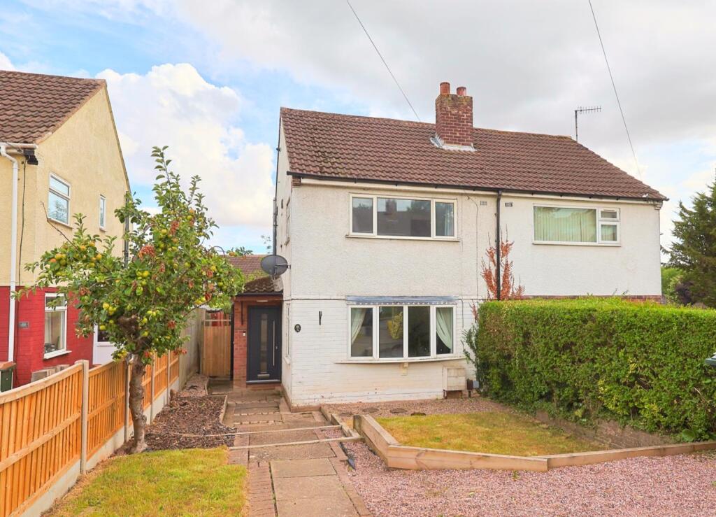 Front of Property with Large Driveway