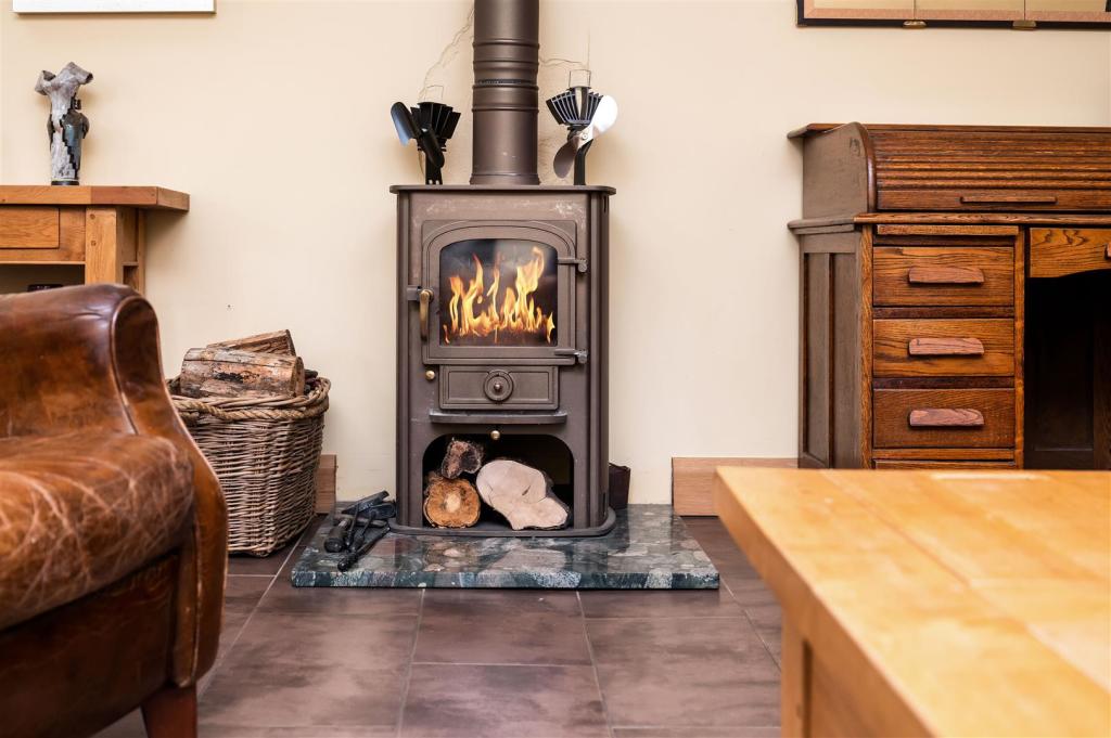 LIVING, DINING, SITTING AREAS AND SNUG
