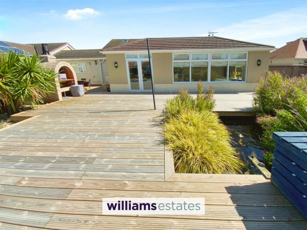 rear decked terrace &amp; pond