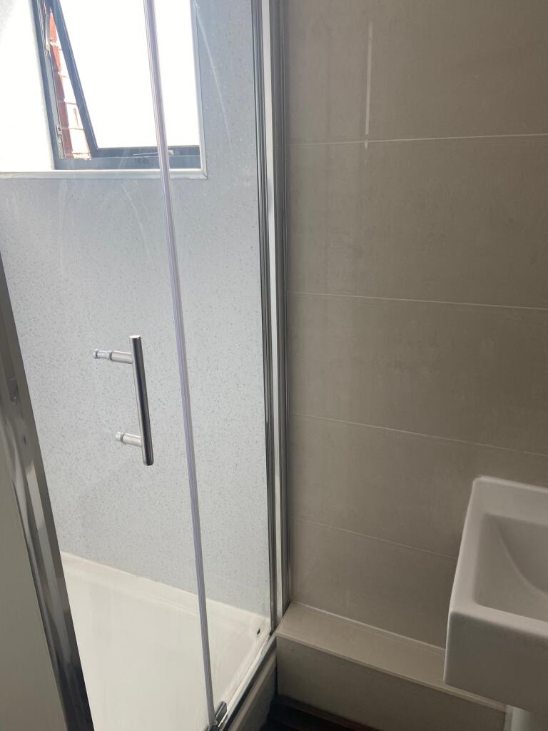 A modern and clean bathroom featuring a stylish...