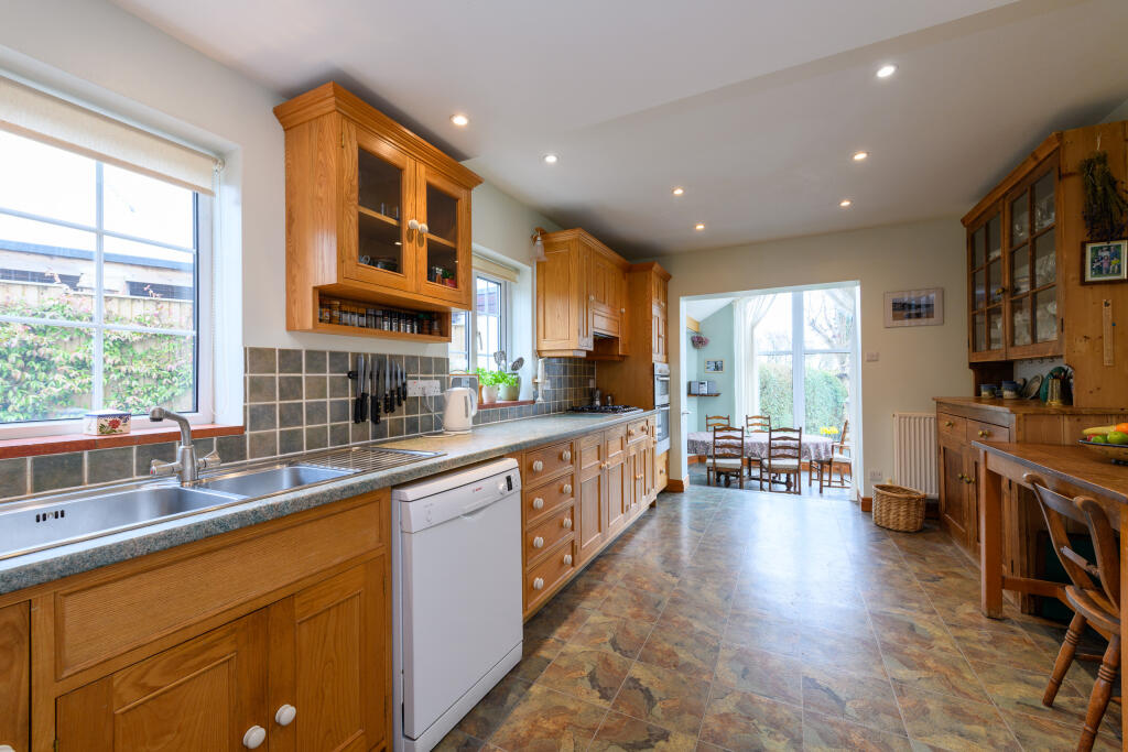 Kitchen with garden room off
