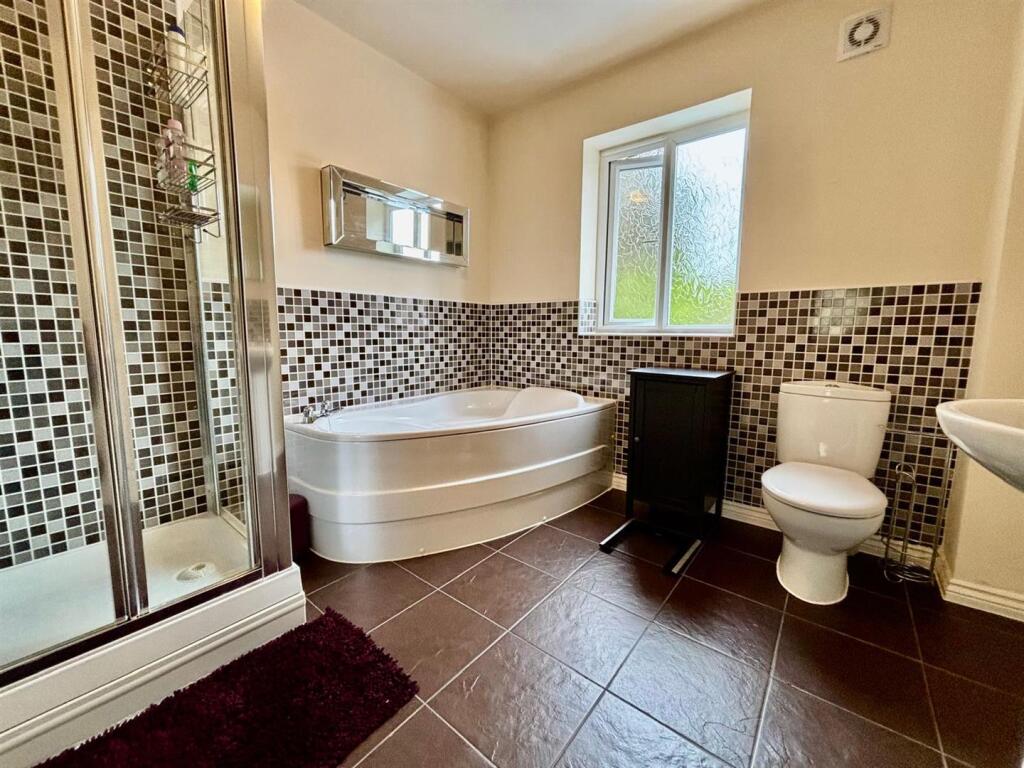 En-suite Bath &amp; Shower Room / WC: