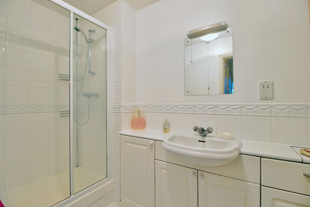 En-suite with large shower enclosure