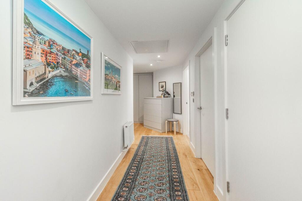 HALLWAY WITH ADDITIONAL BESPOKE STORAGE BUILT IN