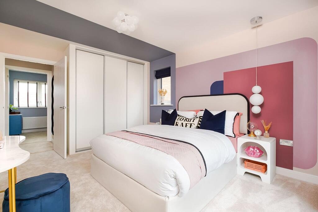 A generously sized bedroom 2