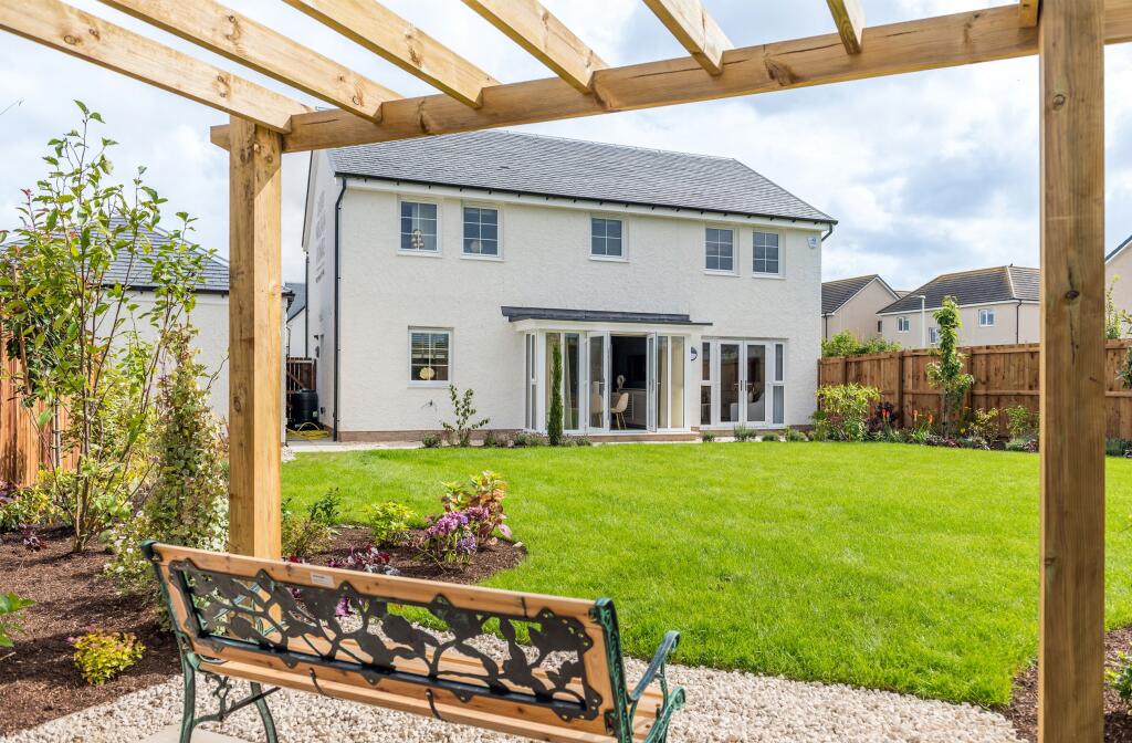 Back garden of 4 bedroom home