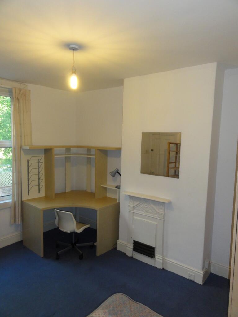 A functional study area with a corner desk and ...