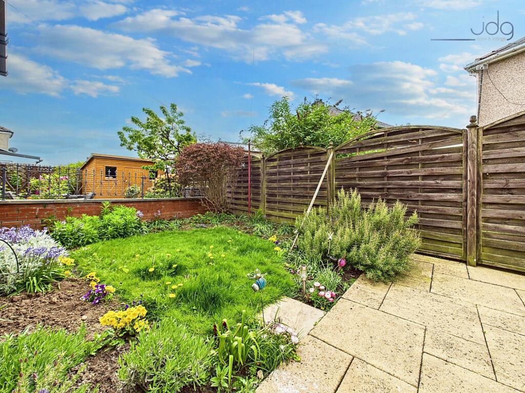 A combination of paved and lawned areas