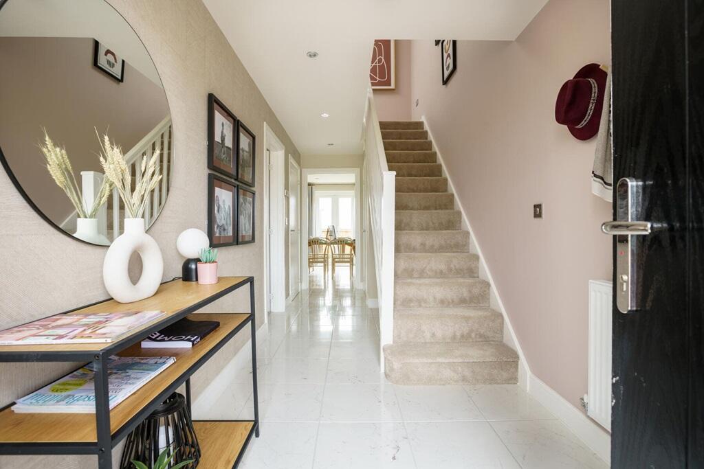 The entrance hall is light and welcoming