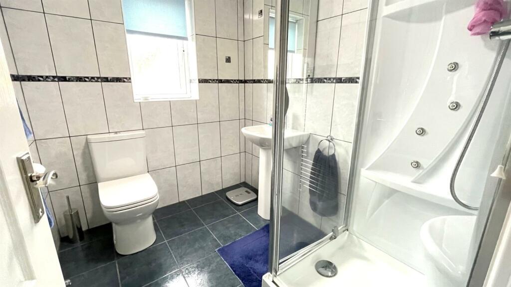TILED 3 PIECE SHOWER ROOM EN SUITE