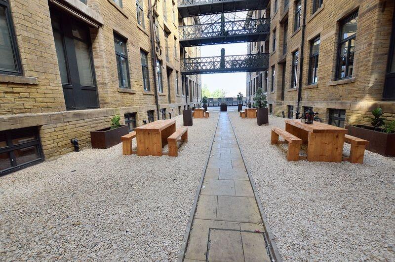 A beautifully maintained communal outdoor garde...