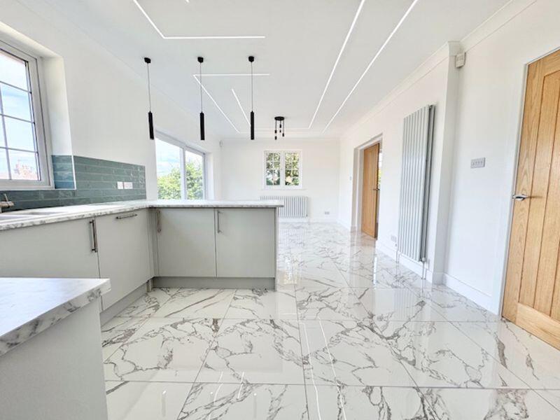 Kitchen breakfast to dining living area