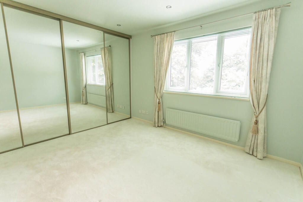 Bedroom 1 with wardrobes