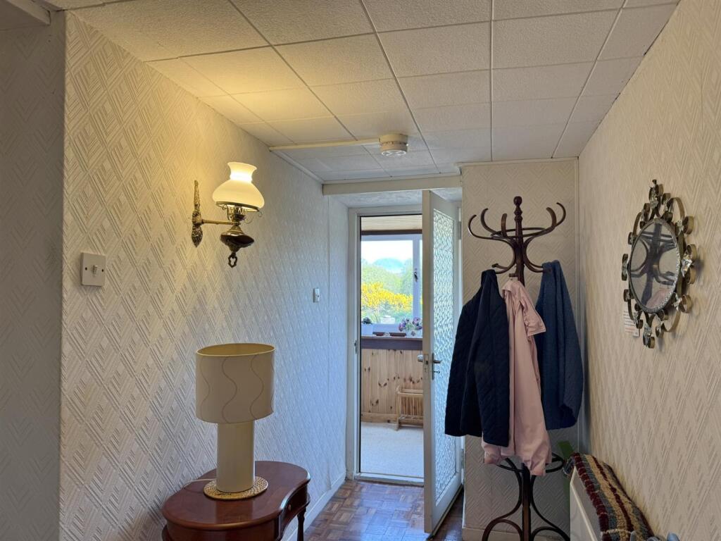 Hallway to entrance porch