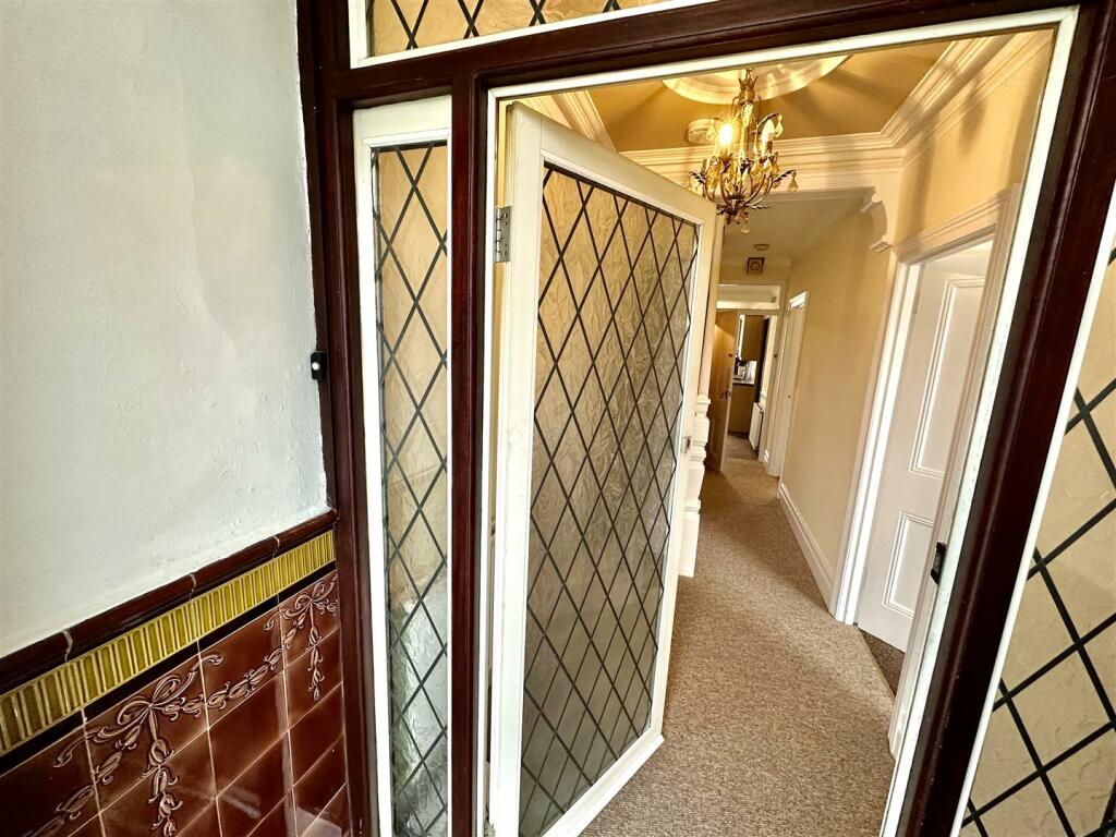 Front Entrance Door to -