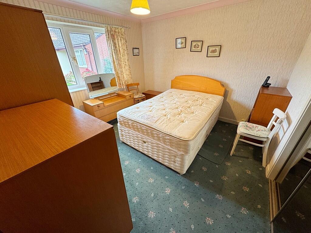 Bedroom One alt a...