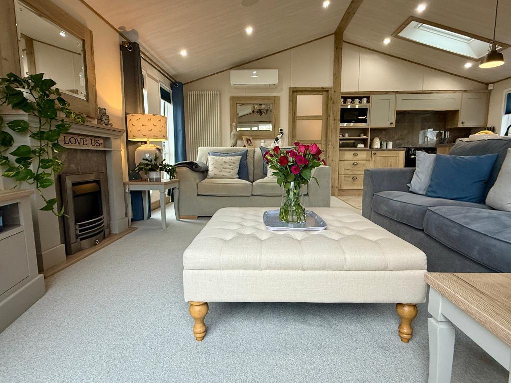 Comfortable open plan sitting room.