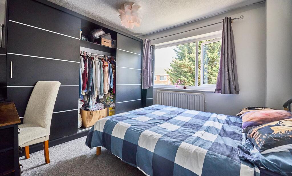 BEDROOM ONE TO REAR