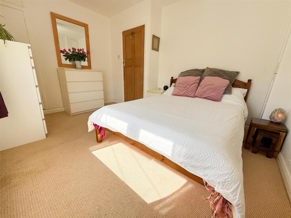 PRIMARY BEDROOM ONE