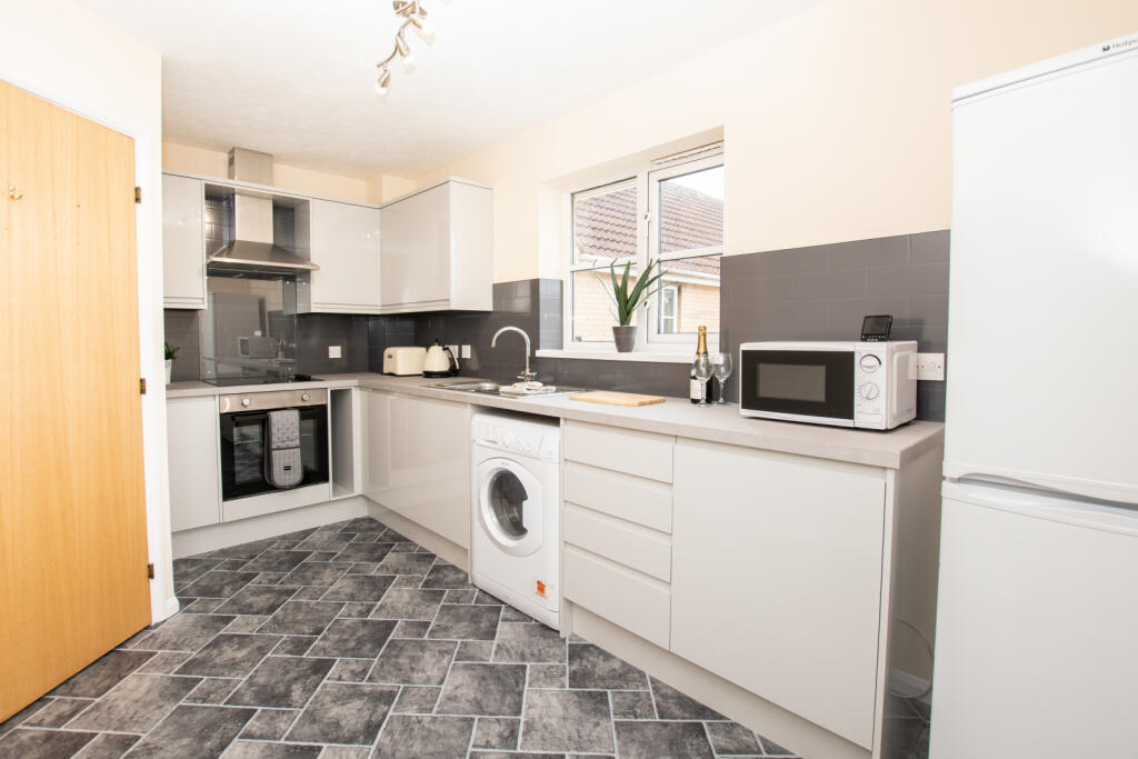 A top floor apartment with views across Worth for