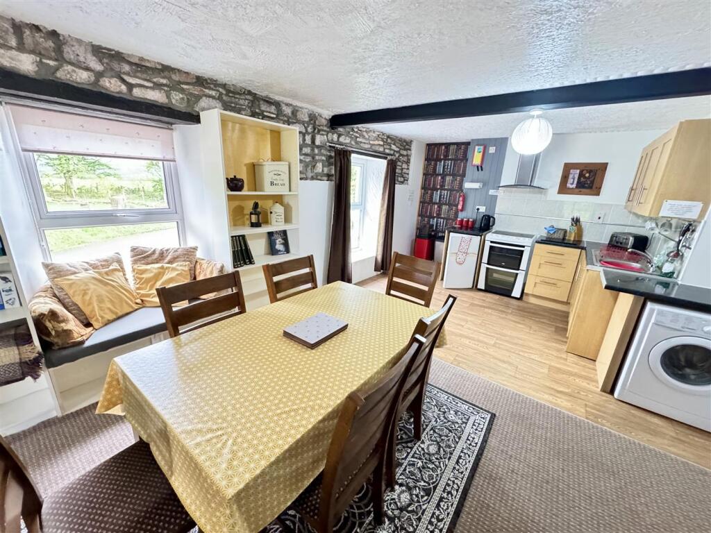 FRONT OPEN PLAN KITCHEN/ LIVING AND DINING AREA