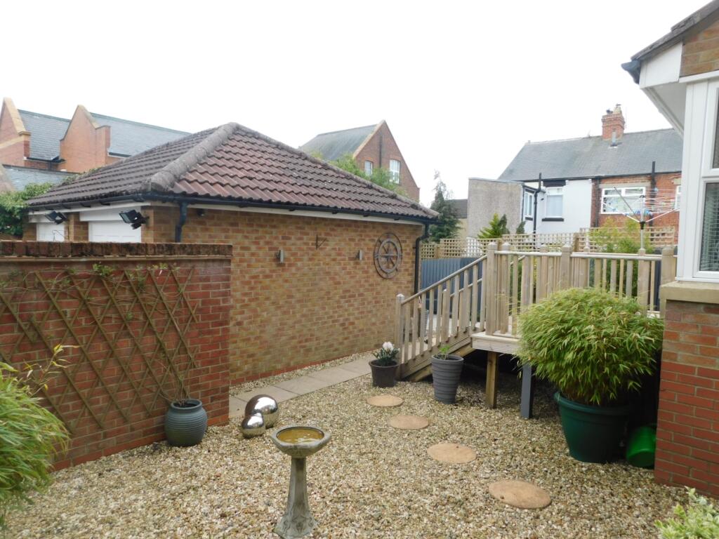 REAR GARDEN AND GARAGE