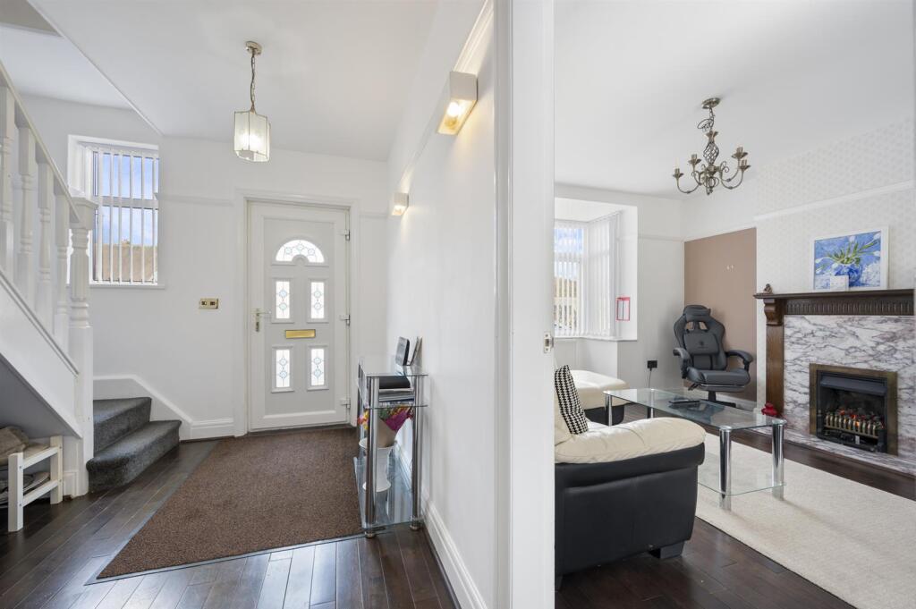 Entrance Hallway and Sitting Room.jpg