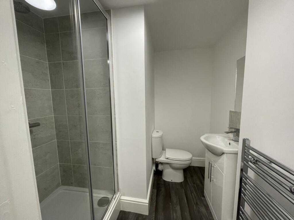 A modern and well-maintained bathroom featuring...