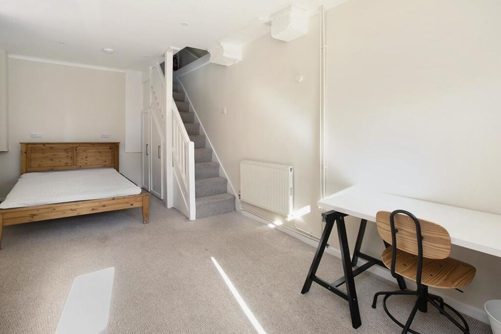 14Archibold202208...