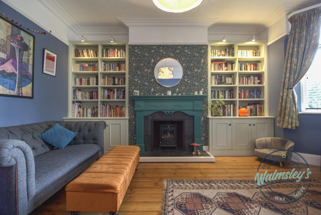 Front sitting room with log burner and bay
