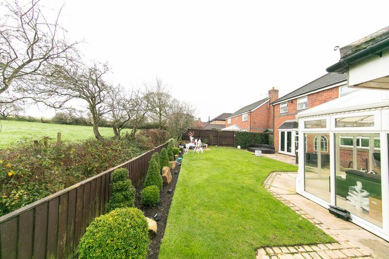 Private garden with open aspect beyond