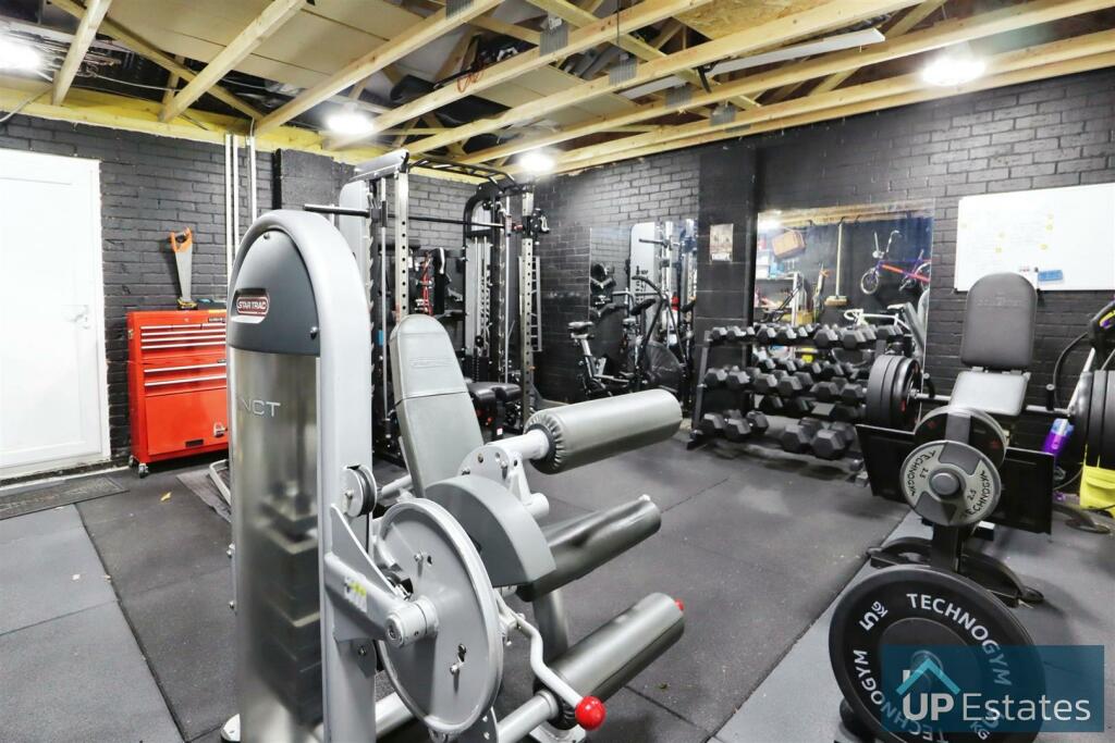 GARAGE CUURENTLY USED AS A GYM
