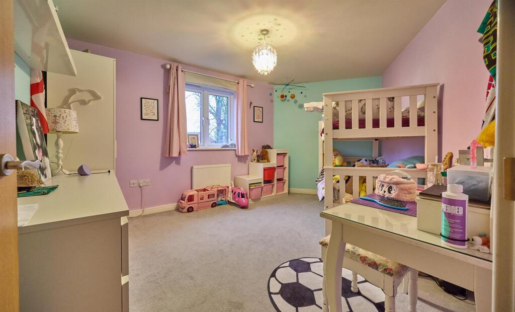 Bedroom four to rear