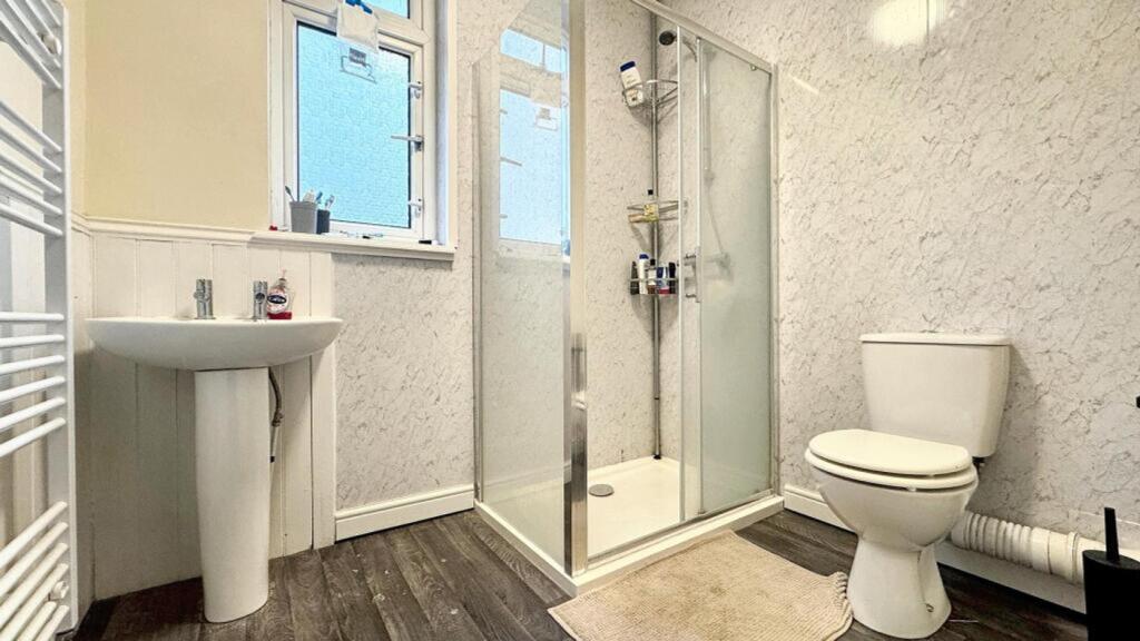 A modern and well-maintained bathroom featuring...