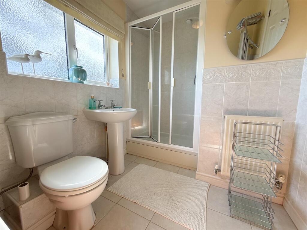 FAMILY BATH AND SHOWER ROOM