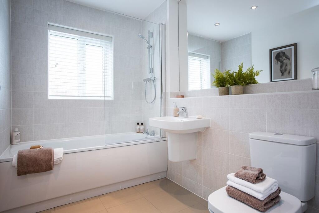 A main bathroom with high quality fixtures and fittings