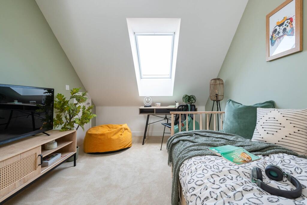 Bedroom for the kids or could be used as a den area