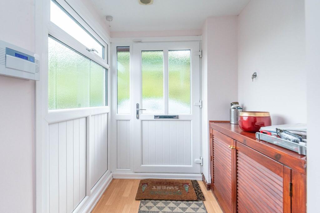 ENTRANCE HALLWAY AND LANDING