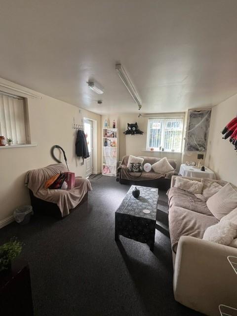 A comfortable and inviting living room featurin...