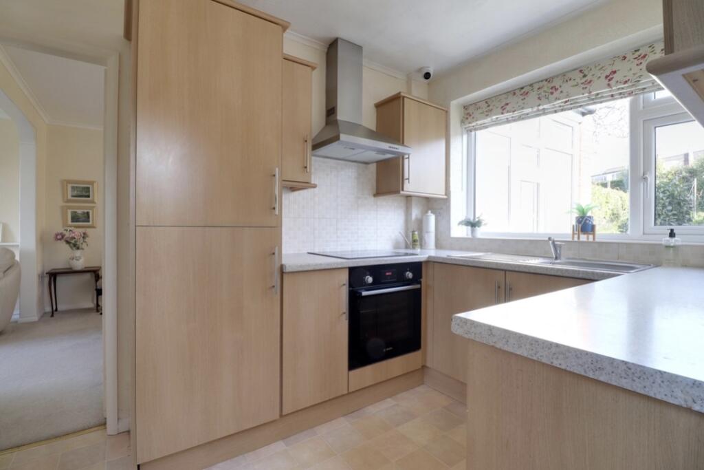 Kitchen adjacent to dining room