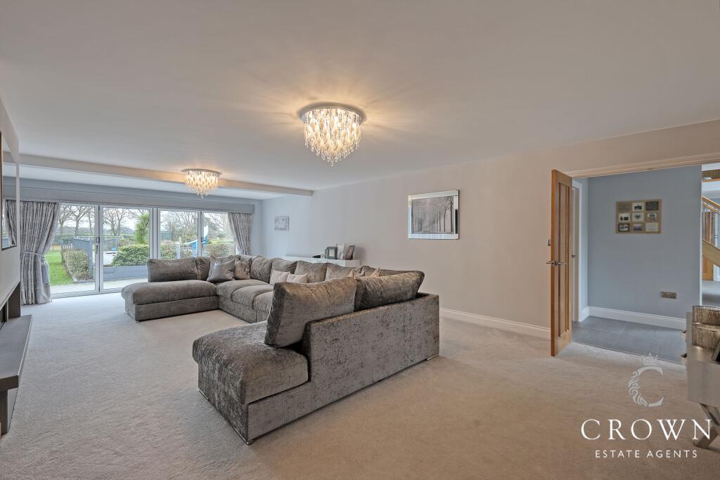 Formal Lounge with double doors leading from the h