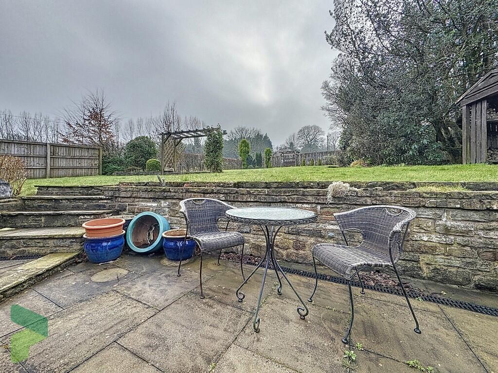 Rear patio and ga...