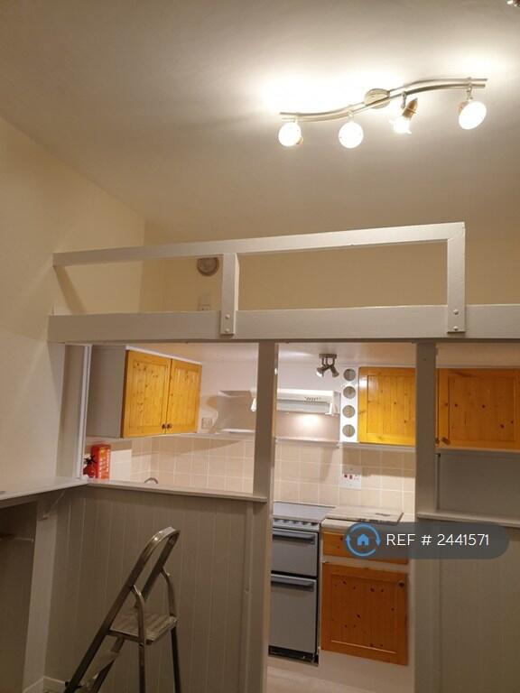 Kitchen Area Below The Mezzanine Platform