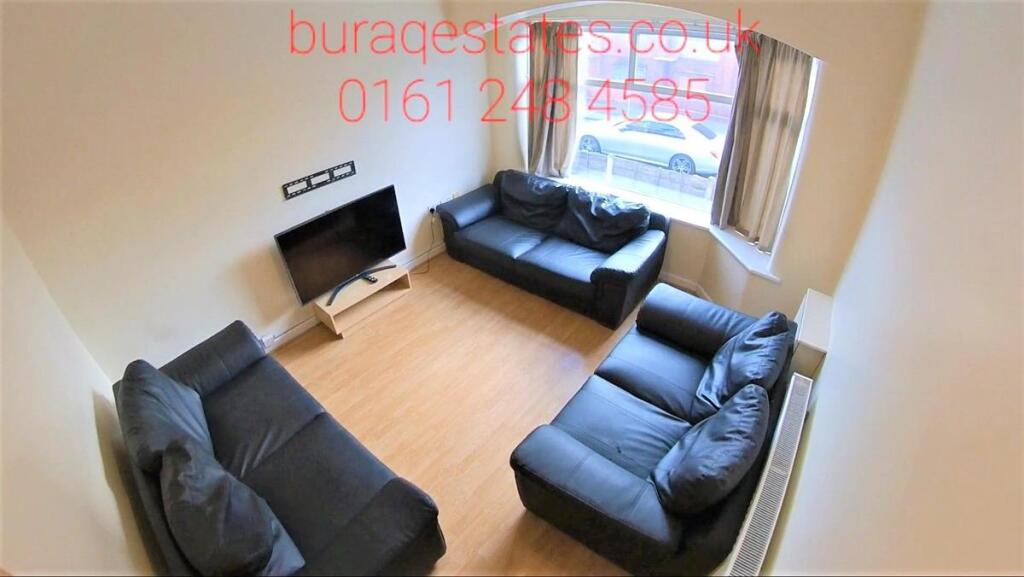 Bright and inviting living room featuring three...